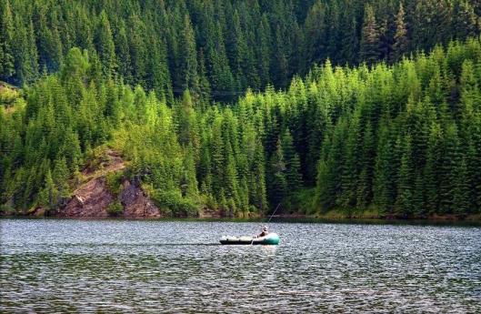 lacul Vidra lake Voineasa Romania boat Carpathians Parang mountains beautiful natural landscapes